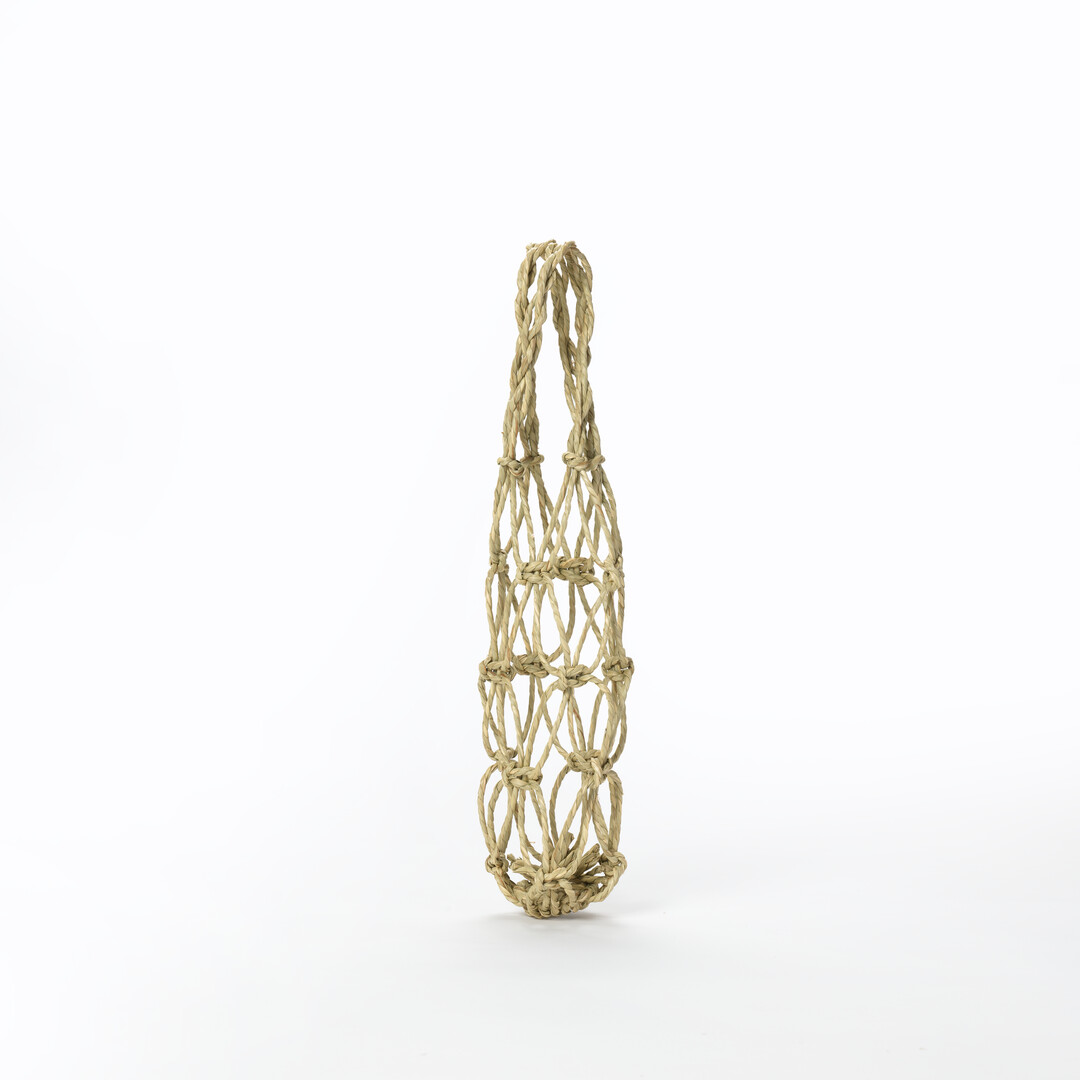 Small hand woven igusa bag from Japan House London