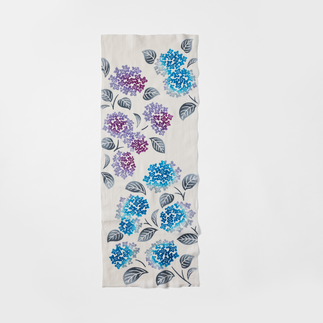 Blue and purple hydrangeas on a tenugui by Kamawanu from Japan House London