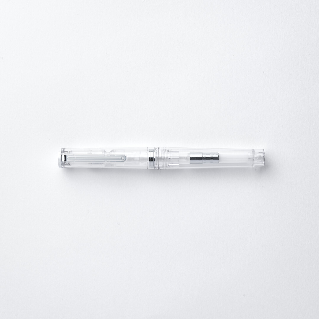 A transparent Fountain Pen - TUZU Crystal White from Japan House London.