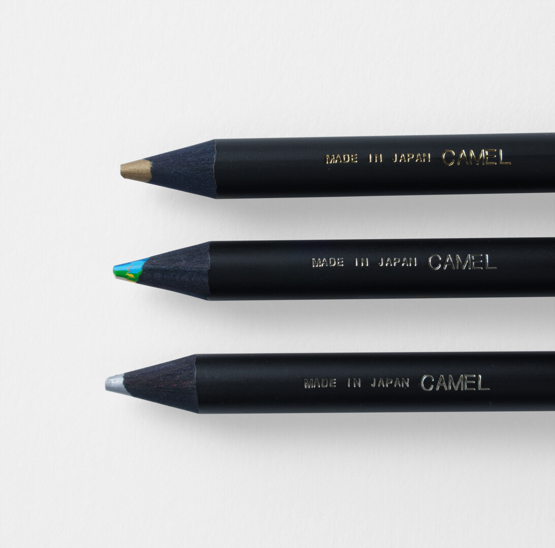 A set of three coloured pencils in black by CDT from Japan House London.