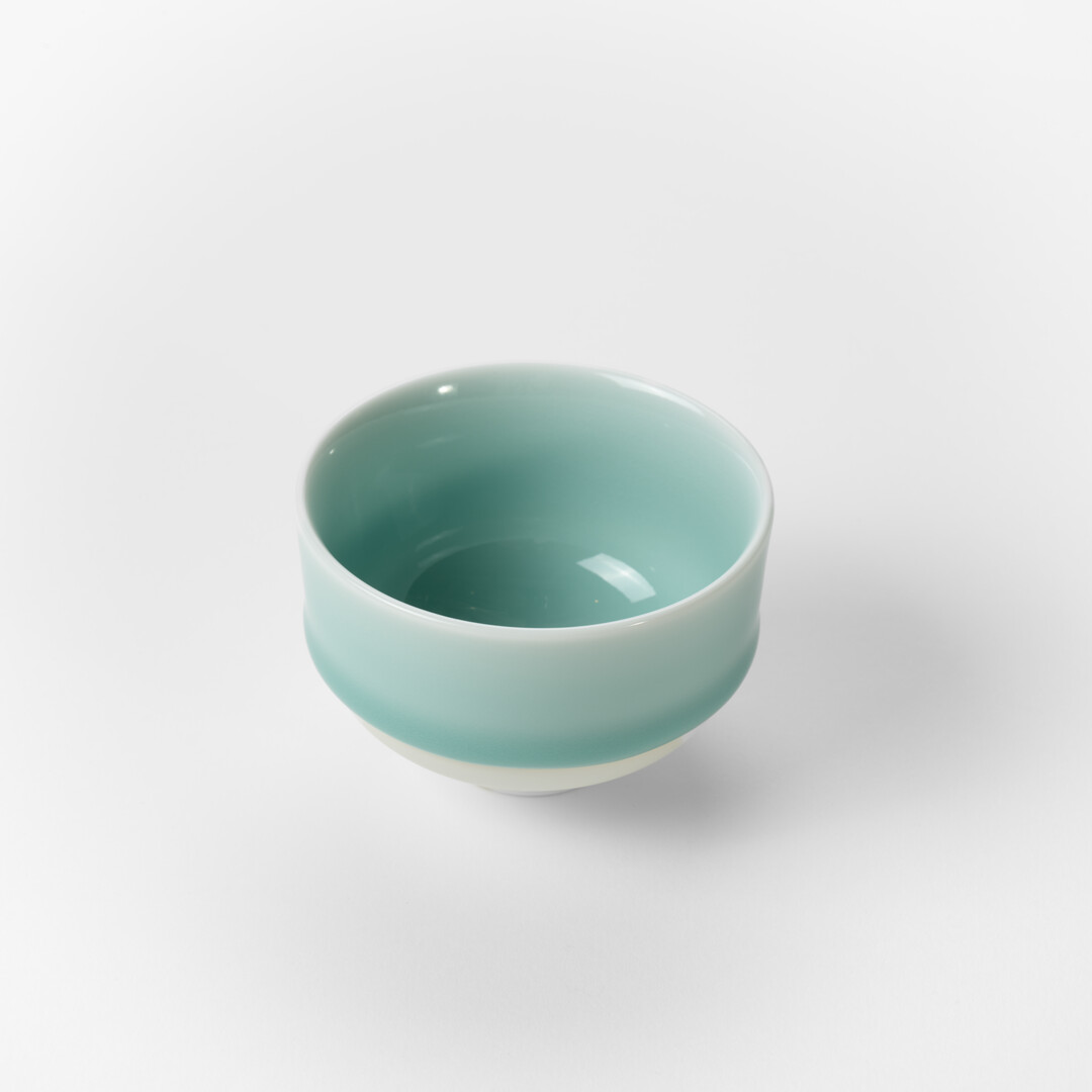Nabeshima Celadon tea cup in a light turquoise from Japan House London.
