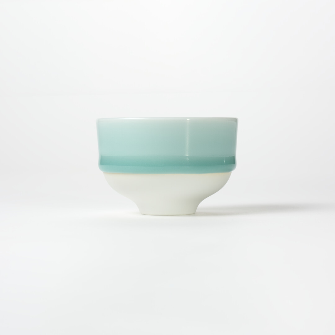 Nabeshima Celadon tea cup in a light turquoise from Japan House London.