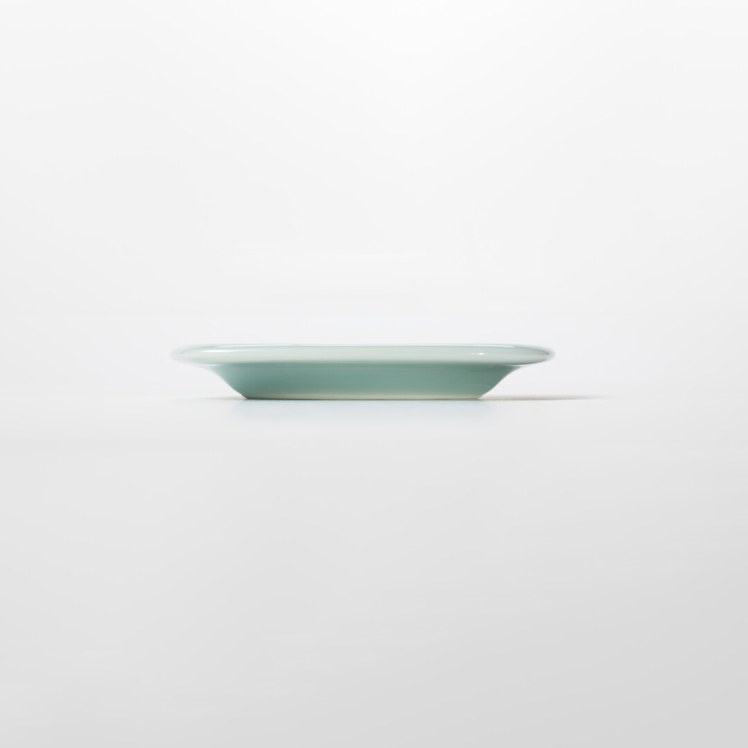 Nabeshima Celadon small plate in a light turquoise from Japan House London.