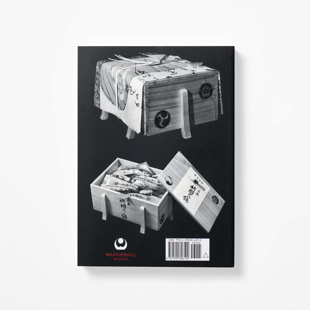 A black and white cover of the book How to Wrap Five Eggs from Japan House London.
