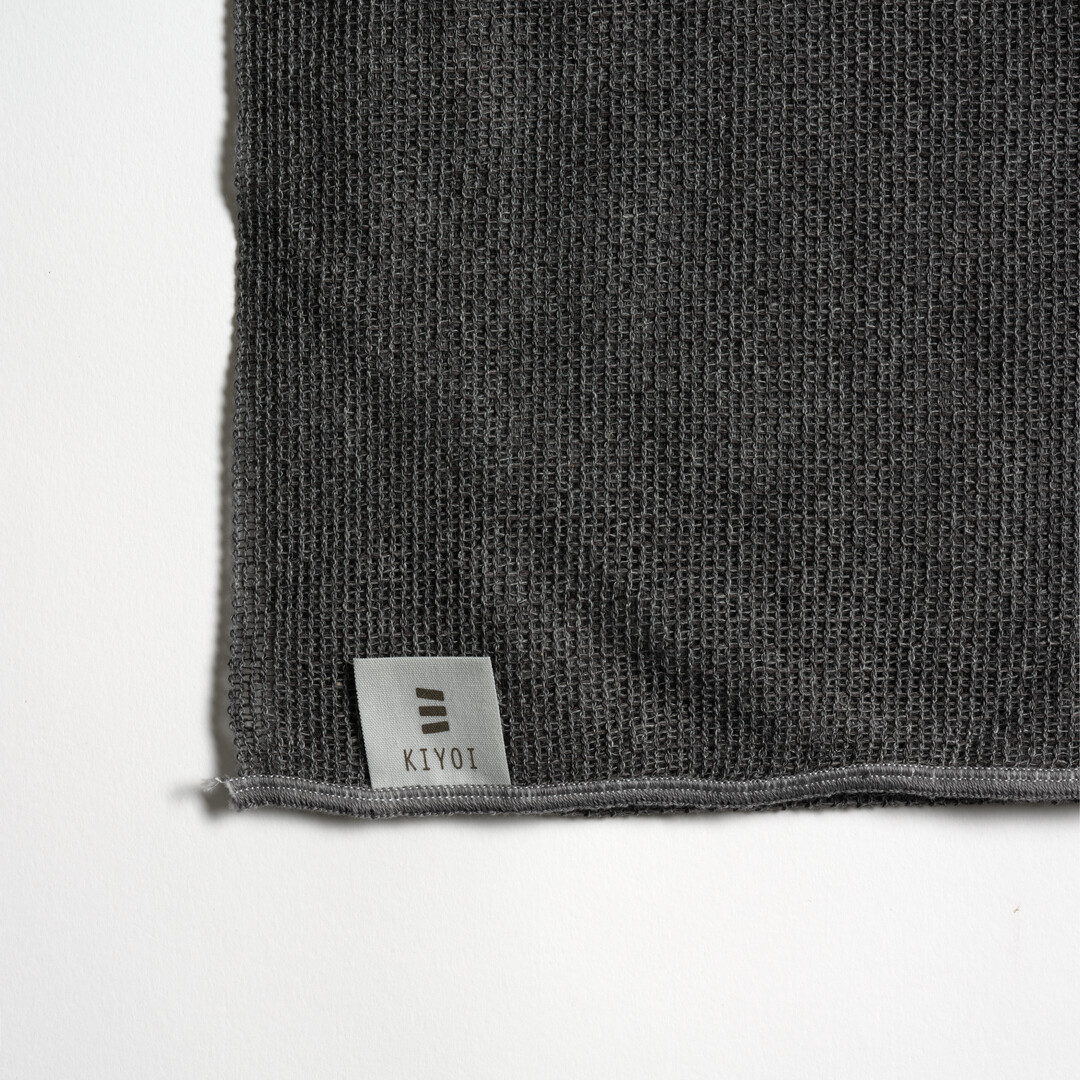 Grey charcoal and corn fibre body Towel by Kiyoi from Japan House London.