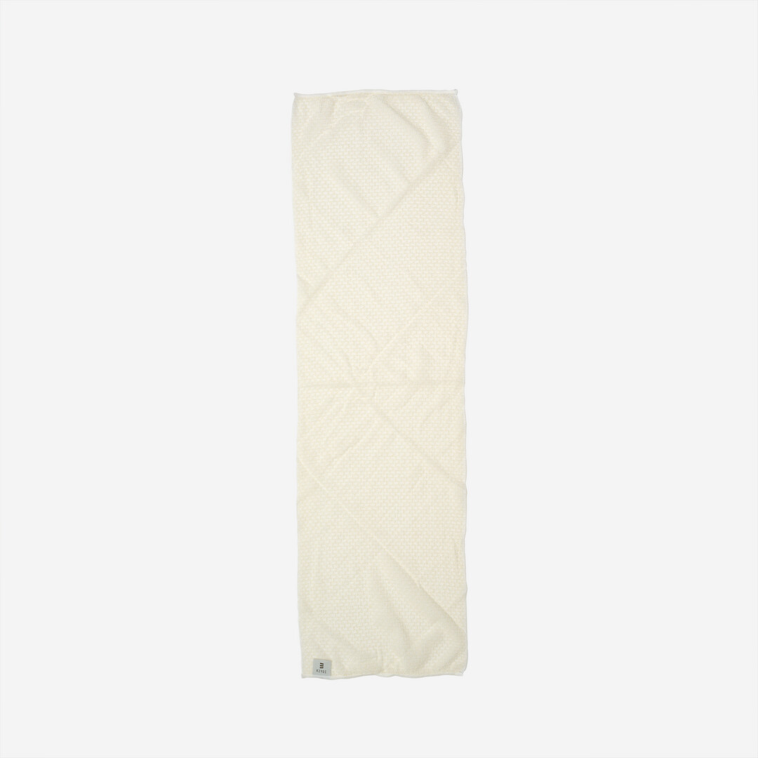 White cotton and silk body towel by Kiyoi from Japan House London.