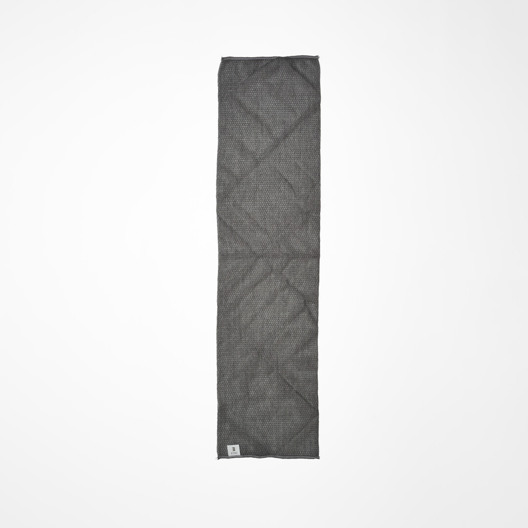 Grey charcoal and corn fibre body Towel by Kiyoi from Japan House London.