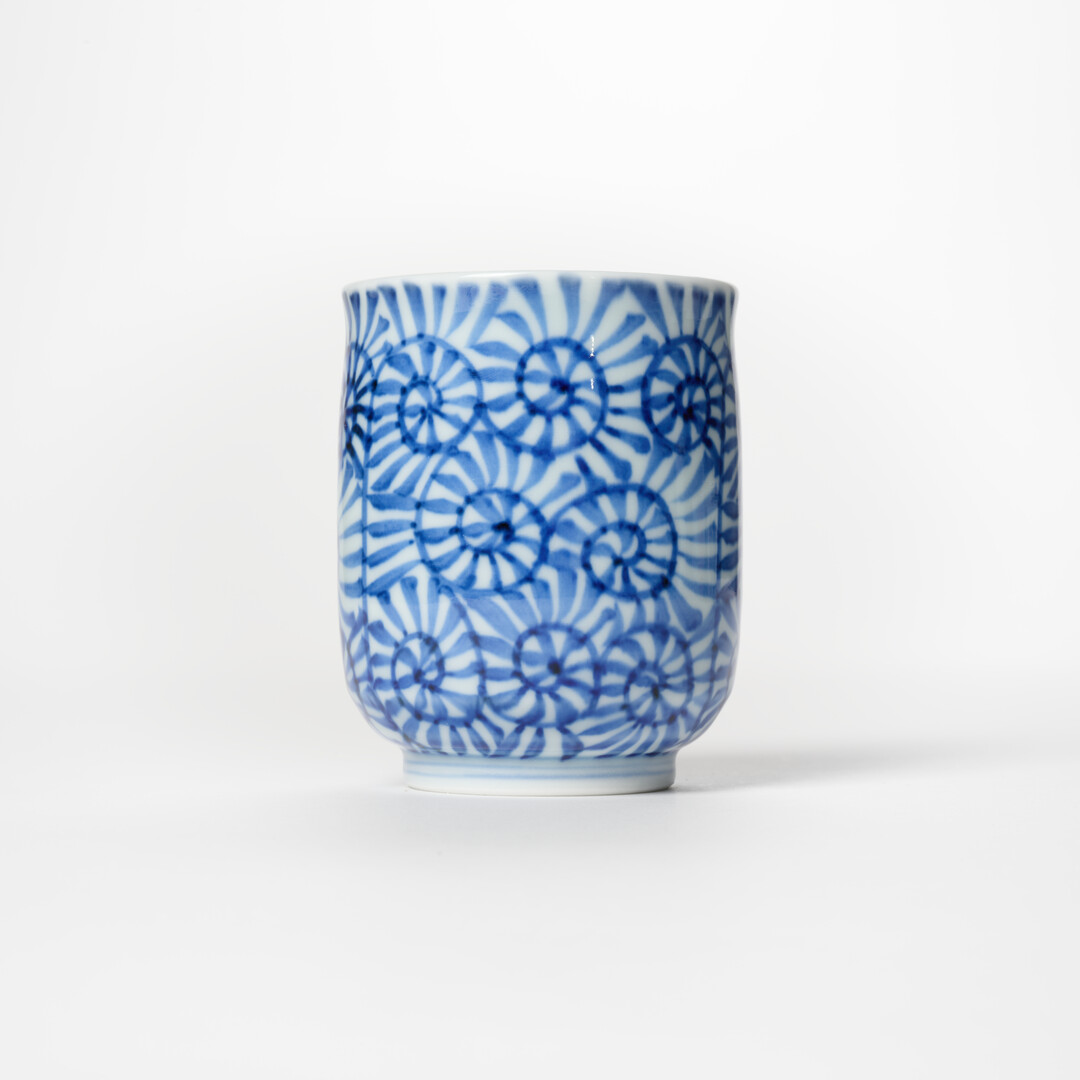 Arita Porcelain Tea Cup with indigo arabesque pattern by Keizangama from Japan House London.