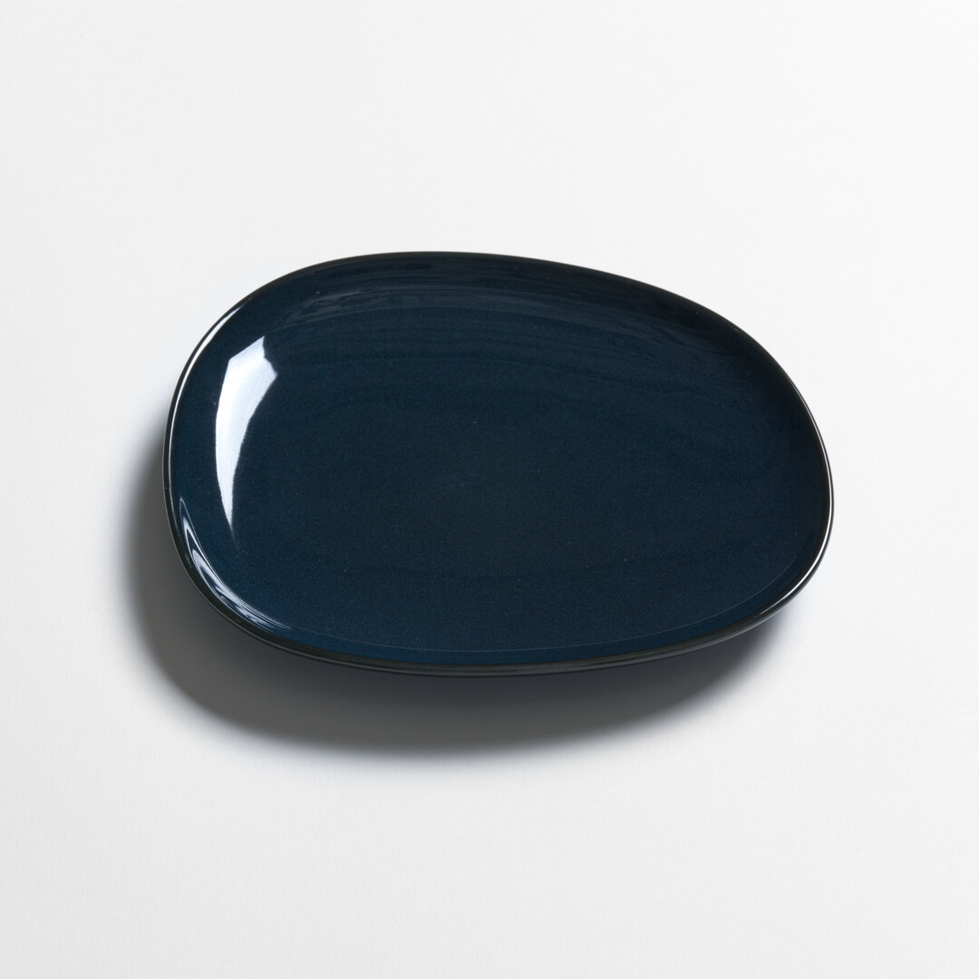 Medium Navy Porcelain plate from series Petra by Hakusan from Japan House London.