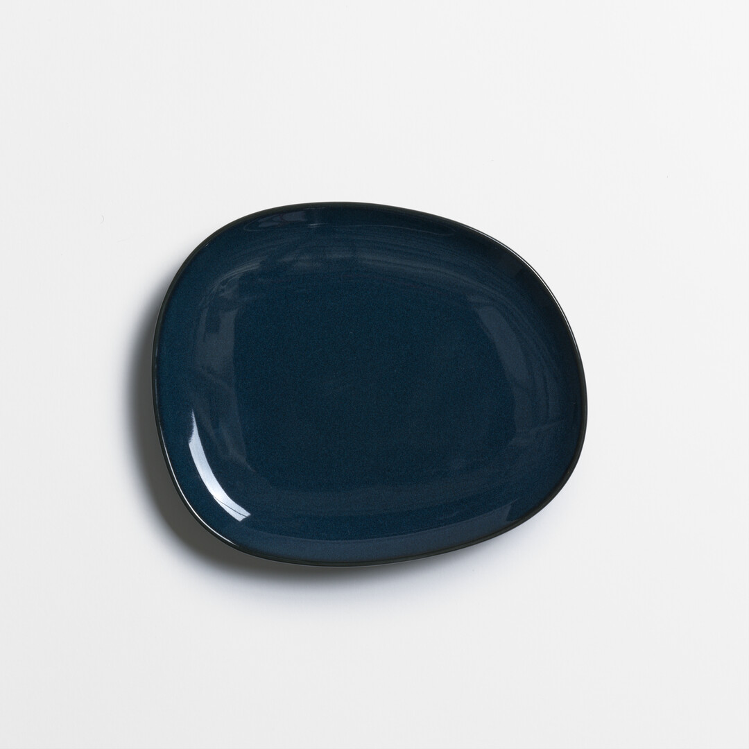 Medium Navy Porcelain plate from series Petra by Hakusan from Japan House London.
