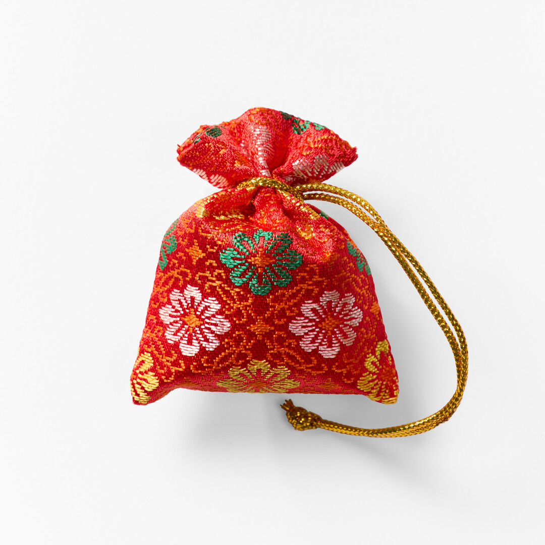 A red sachet Scented Sachet from Japan House London.