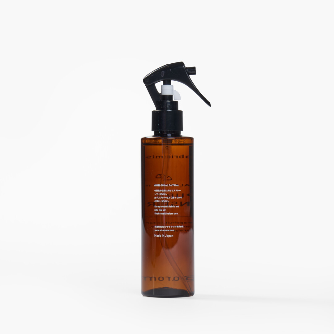A bottle of Fabric Mist Balancing Mind - Pure Inspire from Japan House London.